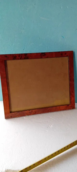 Cornice in legno con vetro