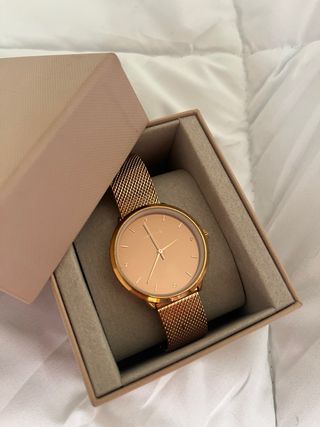 Reloj Parfois oro rosa.