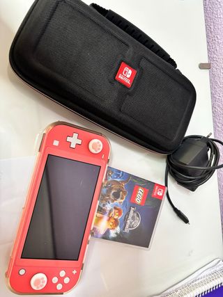 Nintendo Switch Lite + Gioco Lego Jurassic World