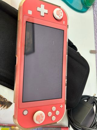 Nintendo Switch Lite + Gioco Lego Jurassic World