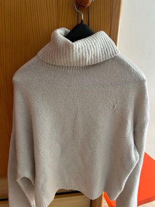 Jersey gris cuello alto