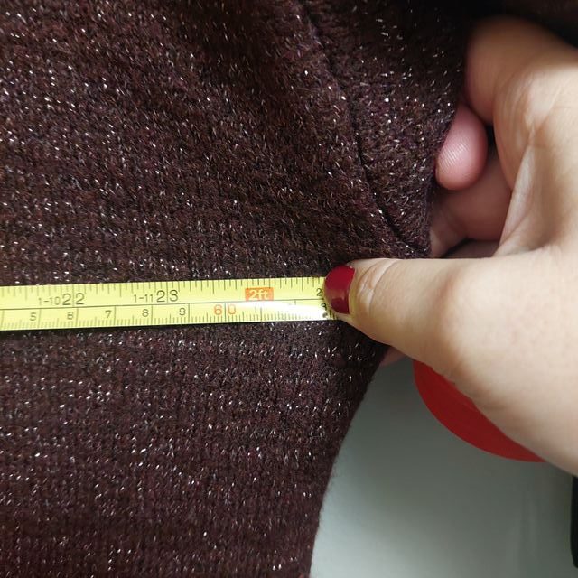 Jersey C&A cuello alto oversize marrón