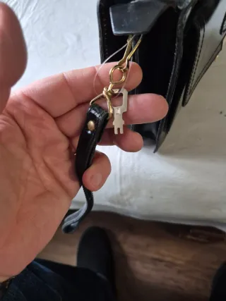 Bolso de mano hombre negro cuero