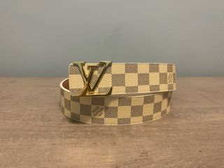 Cintura a scacchi bianca e grigia con fibia grigia