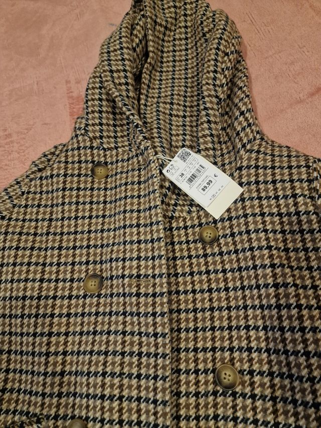 Pantalones Stradivarius grises acampanados