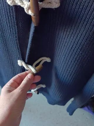 Rebeca de punto azul marino