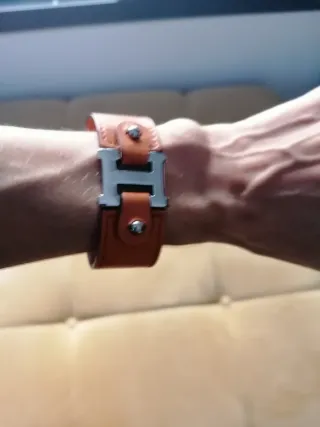Pulsera ancha Hermès naranja y plata