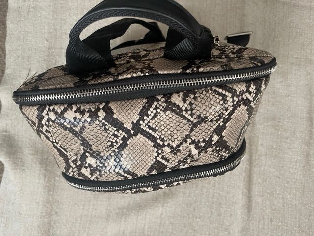 Mochila Parfois estampado serpiente