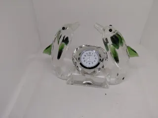 Coppia di delfini in cristallo con orologio