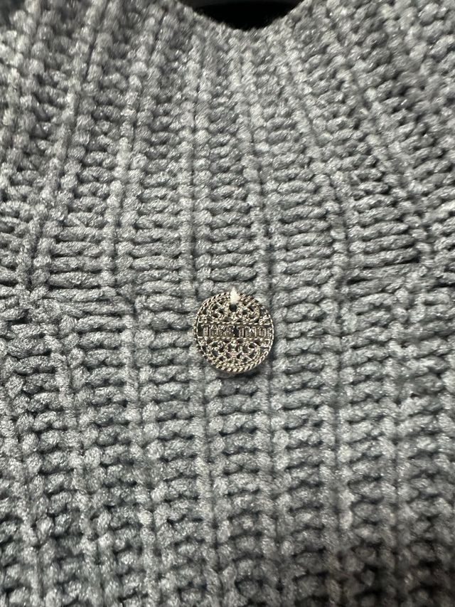 Maglione collo alto effetto maglia