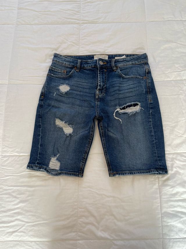 Pantalones cortos vaqueros rotos