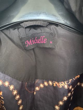 Abrigo largo de plumas negro