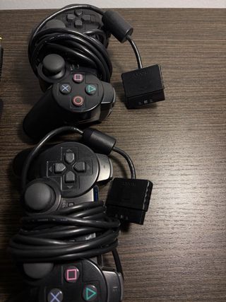 PlayStation 2 con giochi Spyro e Shrek 2