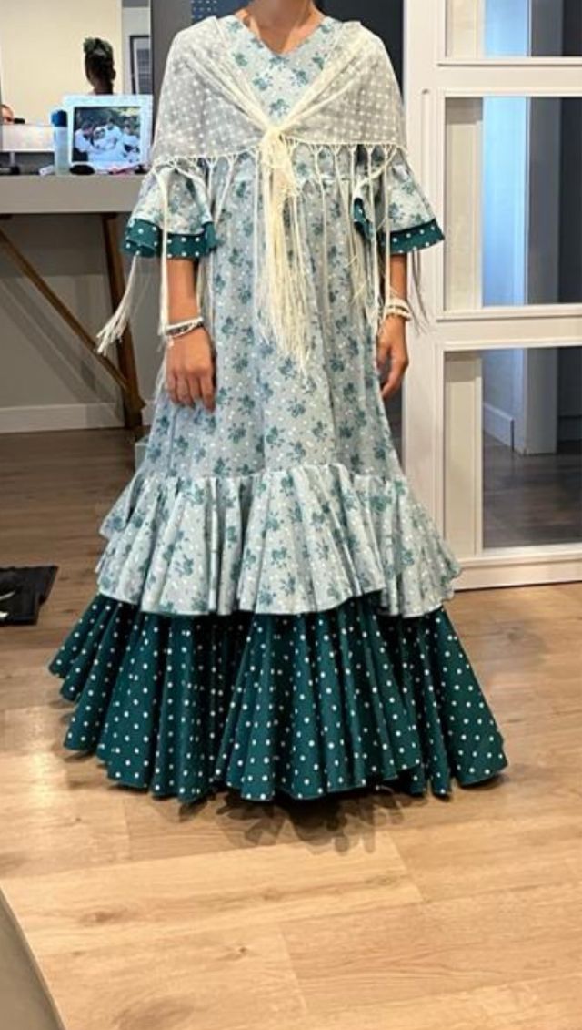 Traje de flamenca verde con volantes