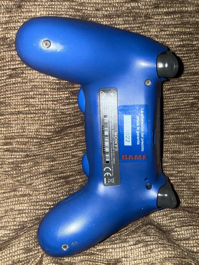 Mando PS4 azul con ruido interior