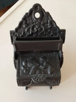 Antiguo cenicero de tren de fundición