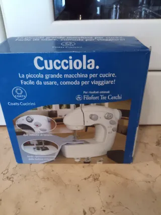 Macchina da cucire portatile Cucciola Coats