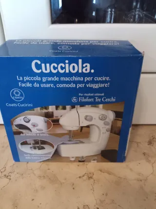 Macchina da cucire portatile Cucciola Coats