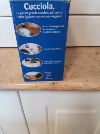 Macchina da cucire portatile Cucciola Coats