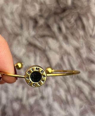 Pulsera Bimba y Lola dorada con círculo negro