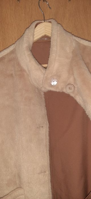 Chubasquero reversible mujer.