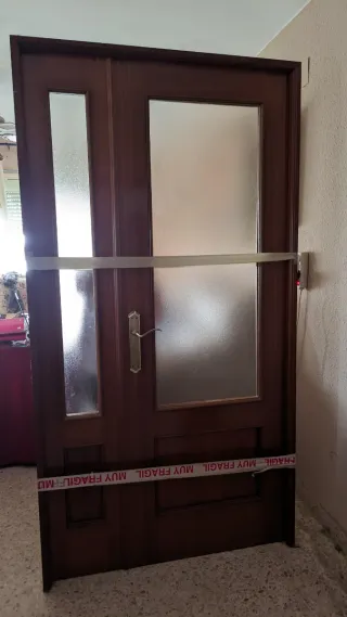 Puerta de paso doble con cristal