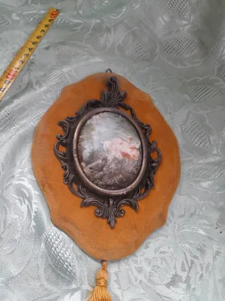 Antico trofeo con cornice