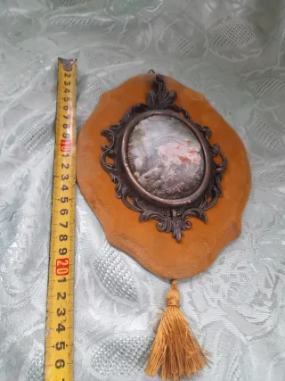 Antico trofeo con cornice