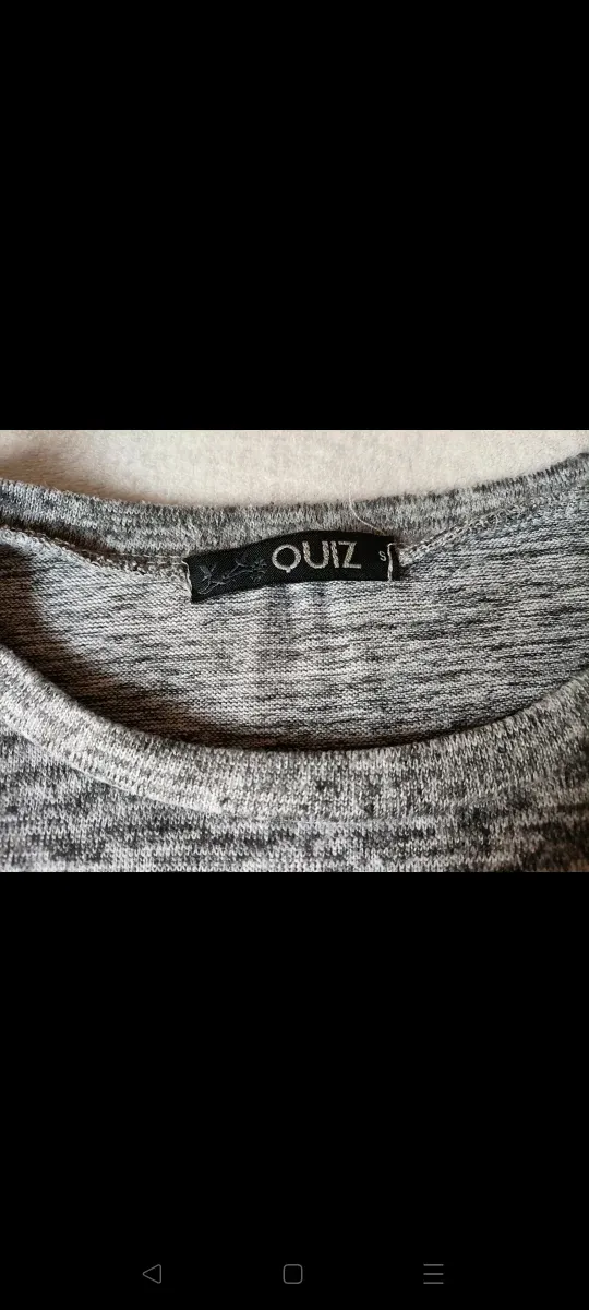 Jersey gris con encaje negro