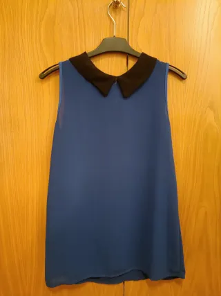 Blusa gasa sin mangas con cuello negro