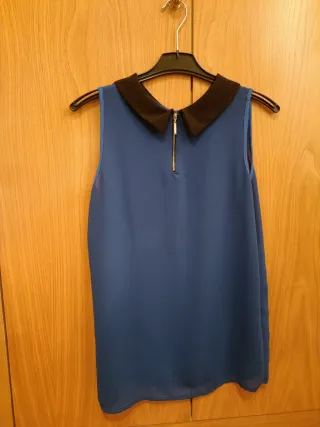 Blusa gasa sin mangas con cuello negro