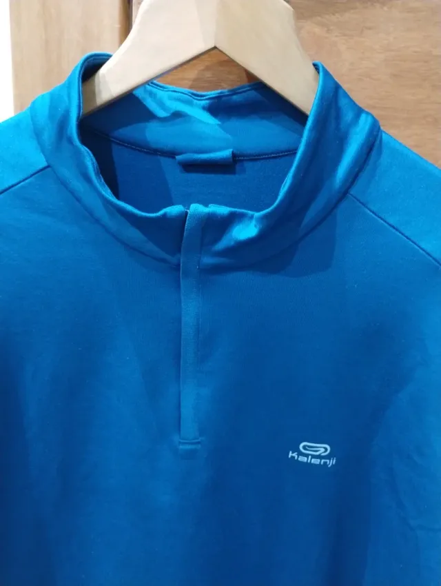 Camiseta 1/2 cremallera azul deportiva