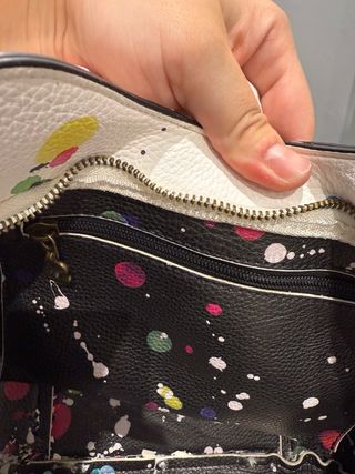Bolso Desigual blanco con manchas multicolor