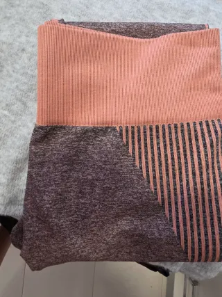 Body de mujer con plumas beige