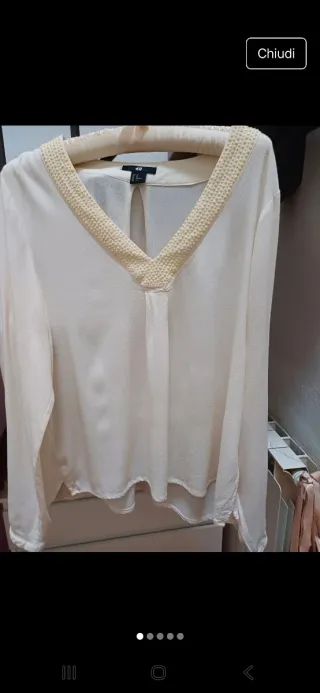 Blusa H&M panna con scollo paillettes