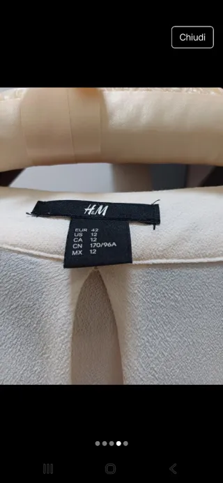 Blusa H&M panna con scollo paillettes