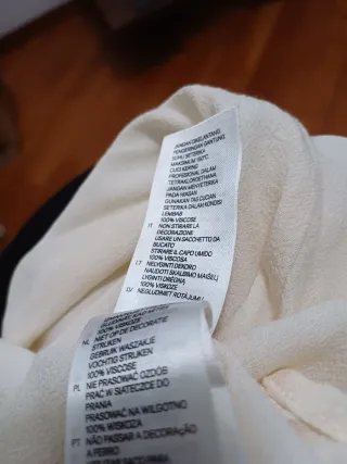 Blusa H&M panna con scollo paillettes