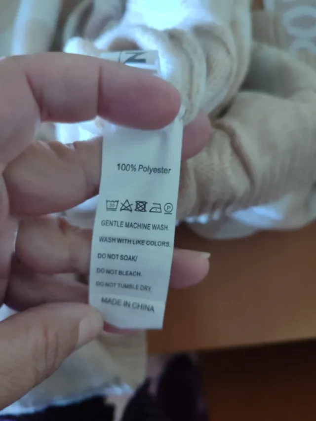 Chaquetilla punto crop top beige y blanco