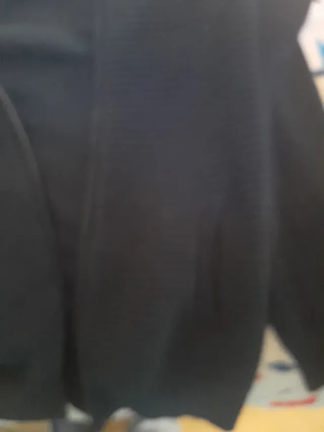 Chaqueta de jersey azul oscuro 12 años.