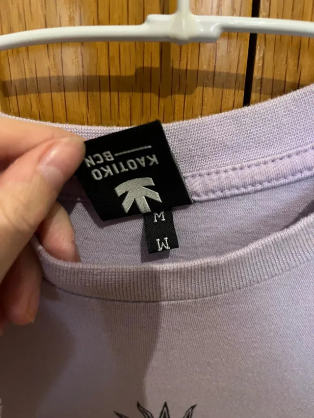 Camiseta Kaotiko Morada con Ojo Solar