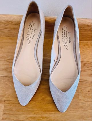 Bolso y bailarinas plateadas Zara