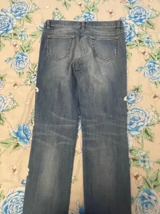 Jeans donna con fiori bianchi