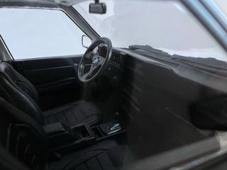 Alfa Romeo 75 Evoluzione 1987 Bianca 1:18 MCG