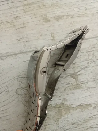 Reloj Tissot Automático Negro y Plateado