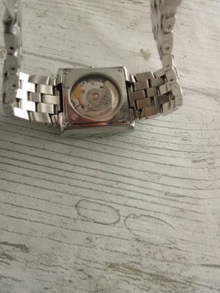 Reloj Tissot Automático Negro y Plateado