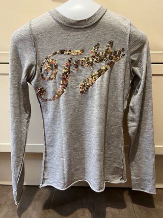 Camiseta gris manga larga con brillantes dorados