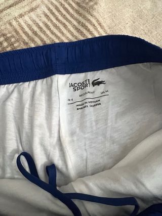 Tuta Lacoste originale blu e rossa