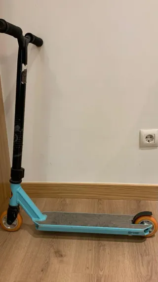 Patinete Oxelo azul para skate