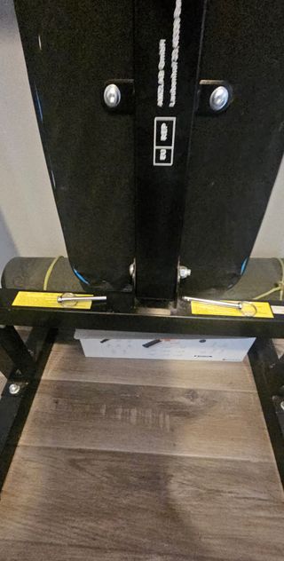 Banco de pesas con barra y discos