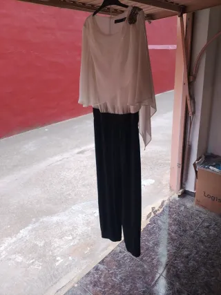 Mono elegante blanco y negro marca Fiesta talla M